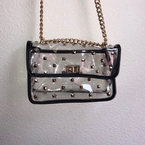 Clear gold studded purse. Never been used before.